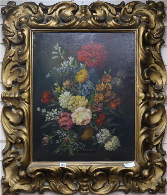 An ornate framed still life